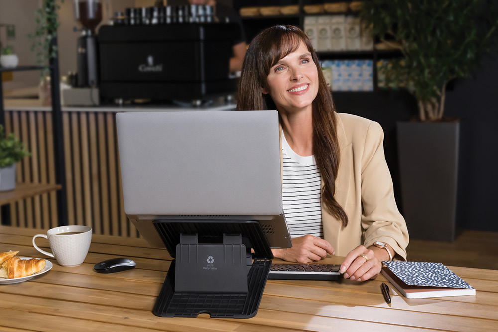 Using a laptop stand to help prevent back ache